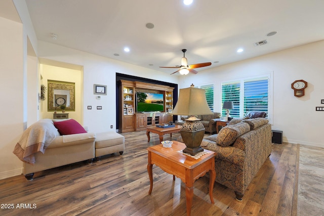 19334 W Pasadena Ave, Litchfield Park, AZ 85340 - living area featuring hardwood / wood-style floors, ceiling fan, baseboards, and recessed lighting