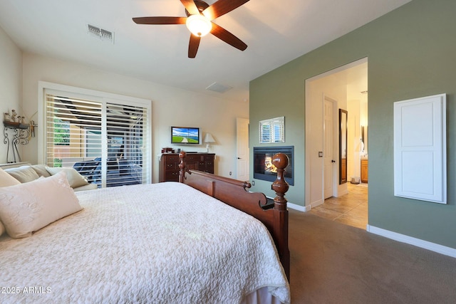 19334 W Pasadena Ave, Litchfield Park, AZ 85340 - carpeted bedroom featuring baseboards and a ceiling fan