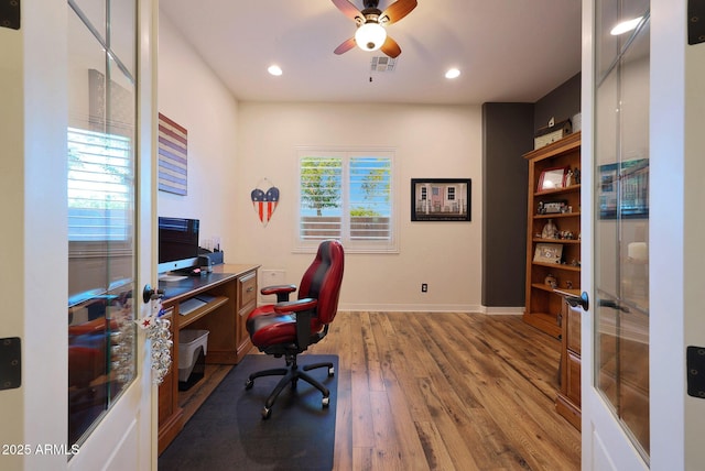 19334 W Pasadena Ave, Litchfield Park, AZ 85340 - home office featuring wood finished floors, a ceiling fan, baseboards, recessed lighting, and french doors