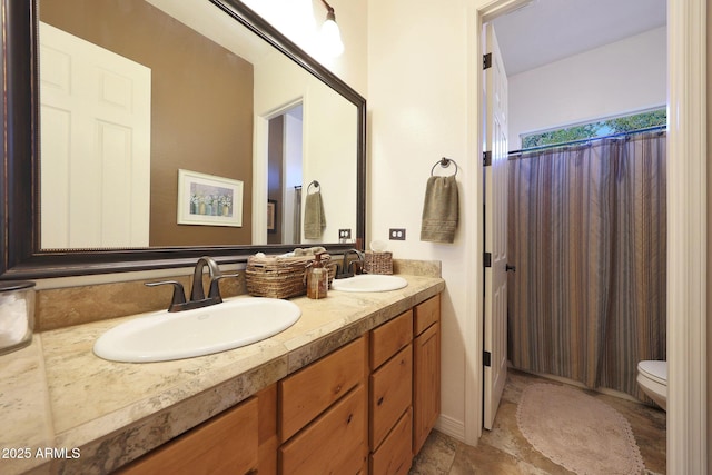 19334 W Pasadena Ave, Litchfield Park, AZ 85340 - full bathroom featuring toilet and double vanity