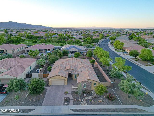 19334 W Pasadena Ave, Litchfield Park, AZ 85340 - aerial view at dusk of a residential view and a mountain view