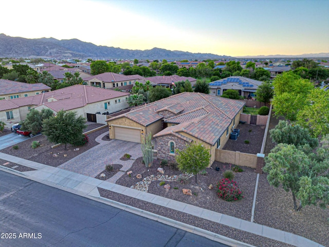 19334 W Pasadena Ave, Litchfield Park, AZ 85340 - aerial perspective of suburban area featuring a mountain backdrop