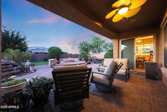19334 W Pasadena Ave, Litchfield Park, AZ 85340 - view of patio / terrace featuring a fire pit and a fenced backyard