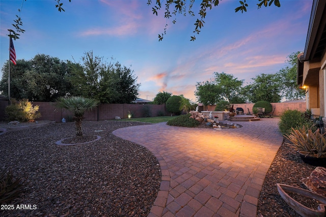 19334 W Pasadena Ave, Litchfield Park, AZ 85340 - fenced backyard featuring a patio