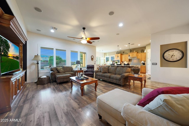 19334 W Pasadena Ave, Litchfield Park, AZ 85340 - living area with ceiling fan, wood finished floors, baseboards, and recessed lighting