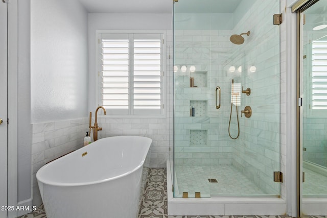 1342 E Jade Dr, Chandler, AZ 85286 - full bathroom featuring a freestanding bath, a shower stall, and tile walls