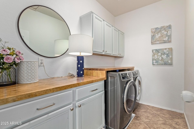 1342 E Jade Dr, Chandler, AZ 85286 - washroom featuring cabinet space, washing machine and dryer, and light tile patterned flooring