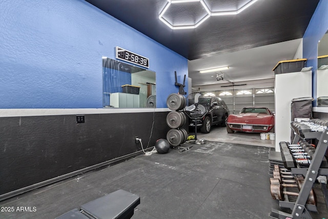 1342 E Jade Dr, Chandler, AZ 85286 - garage featuring a garage door opener and a textured wall