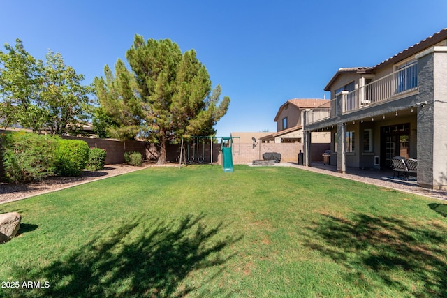 1342 E Jade Dr, Chandler, AZ 85286 - fenced backyard with a balcony, a playground, and a patio area