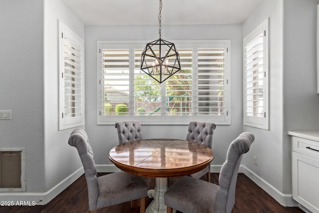 1342 E Jade Dr, Chandler, AZ 85286 - dining area with a chandelier and dark wood-style floors
