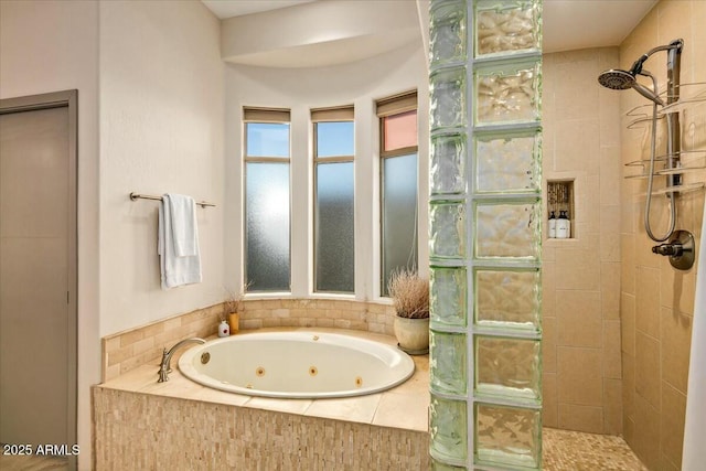 bathroom featuring a whirlpool tub and walk in shower