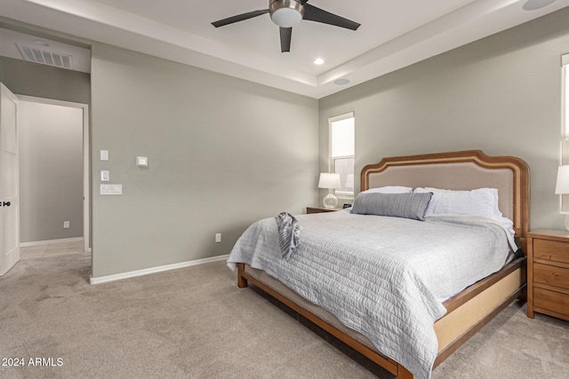 bedroom featuring ceiling fan and carpet