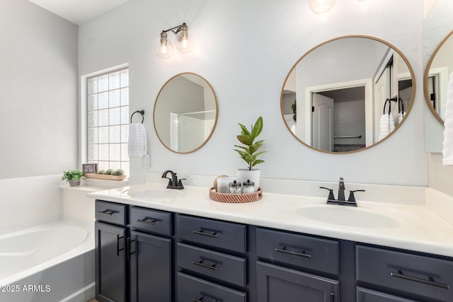 6317 S Banning St, Gilbert, AZ 85298 - bathroom featuring double vanity and a bath