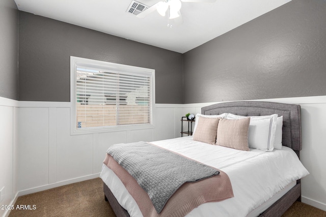 6317 S Banning St, Gilbert, AZ 85298 - carpeted bedroom featuring wainscoting and ceiling fan