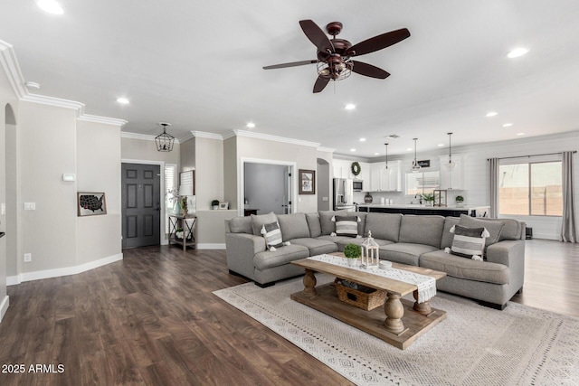 6317 S Banning St, Gilbert, AZ 85298 - living area featuring ceiling fan, dark wood-style floors, recessed lighting, and ornamental molding