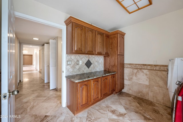 kitchen with dark stone countertops