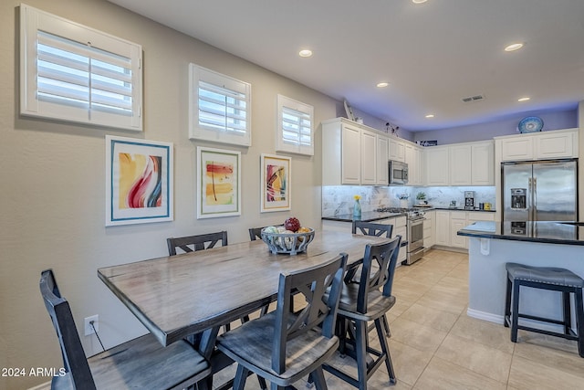 view of tiled dining space