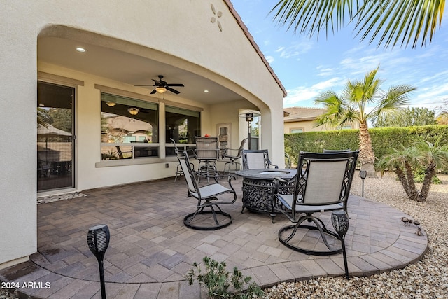 view of patio / terrace featuring ceiling fan