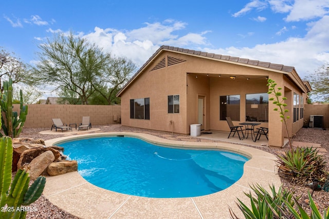 12787 S 175th Ave, Goodyear, AZ 85338 - view of swimming pool with a fenced backyard, a fenced in pool, and a patio
