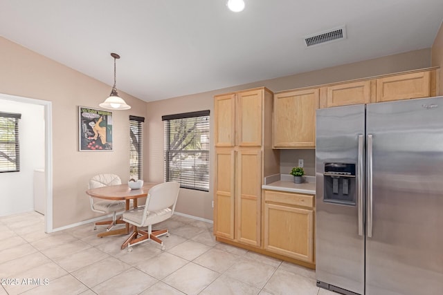 12787 S 175th Ave, Goodyear, AZ 85338 - kitchen featuring visible vents, light brown cabinetry, stainless steel fridge with ice dispenser, light tile patterned floors, and vaulted ceiling