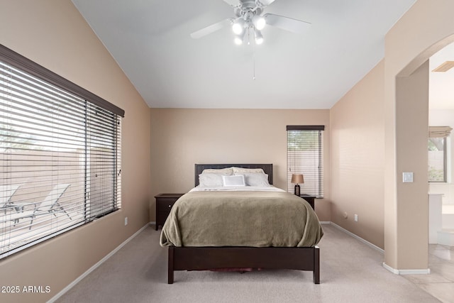 12787 S 175th Ave, Goodyear, AZ 85338 - bedroom with lofted ceiling, baseboards, arched walkways, and light carpet