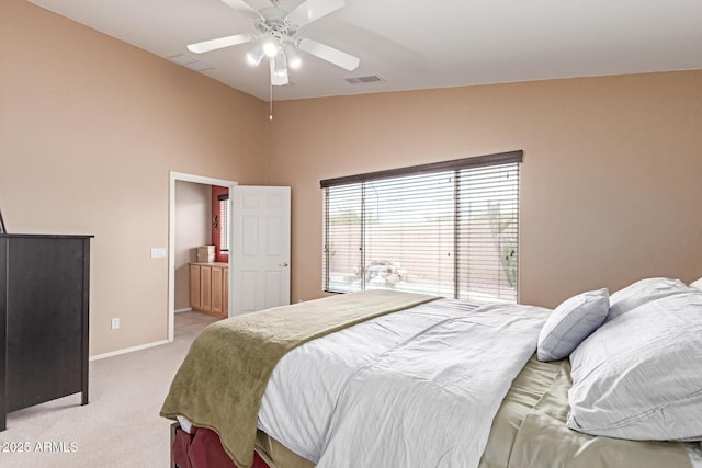 12787 S 175th Ave, Goodyear, AZ 85338 - bedroom with visible vents, baseboards, ceiling fan, vaulted ceiling, and light colored carpet