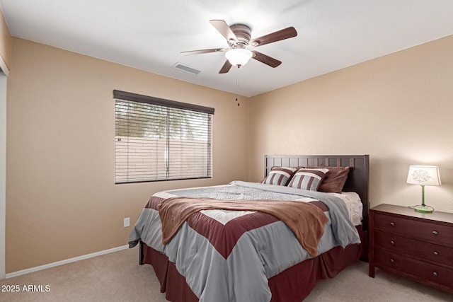 12787 S 175th Ave, Goodyear, AZ 85338 - bedroom with visible vents, light colored carpet, a ceiling fan, and baseboards