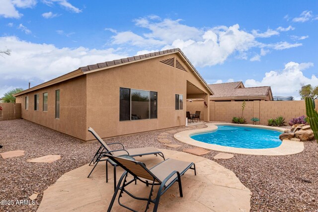 12787 S 175th Ave, Goodyear, AZ 85338 - view of swimming pool featuring a fenced in pool, a patio, and a fenced backyard