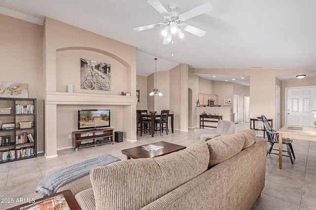 12787 S 175th Ave, Goodyear, AZ 85338 - tiled living area with baseboards, a ceiling fan, and vaulted ceiling