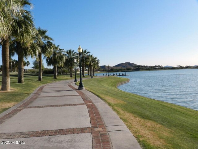 12787 S 175th Ave, Goodyear, AZ 85338 - view of home's community with a lawn and a water view