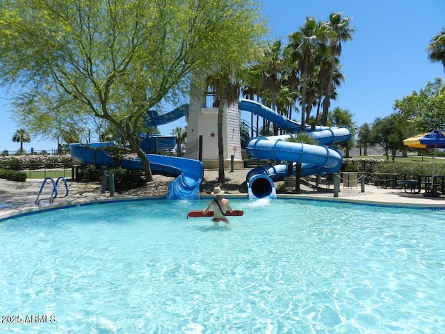 12787 S 175th Ave, Goodyear, AZ 85338 - pool featuring playground community, a water slide, and fence
