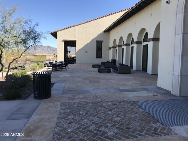 12787 S 175th Ave, Goodyear, AZ 85338 - view of patio / terrace featuring an outdoor living space, outdoor dining area, and a mountain view