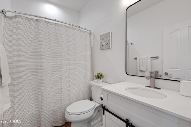 full bath featuring toilet and vanity