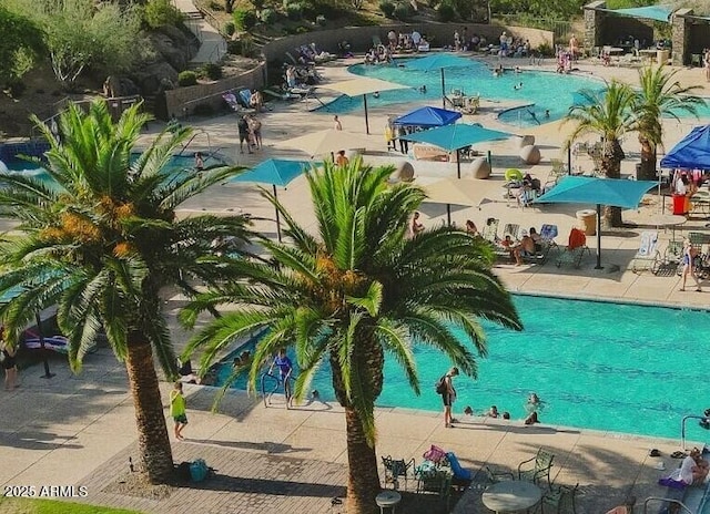 pool with a patio