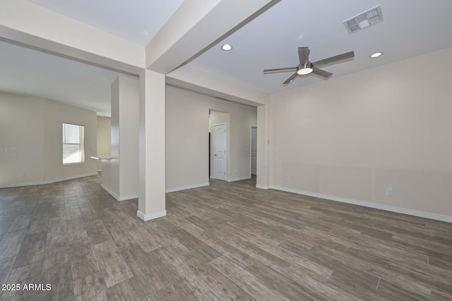 spare room featuring ceiling fan and hardwood / wood-style flooring