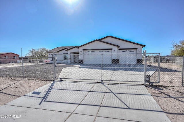 ranch-style home featuring a garage