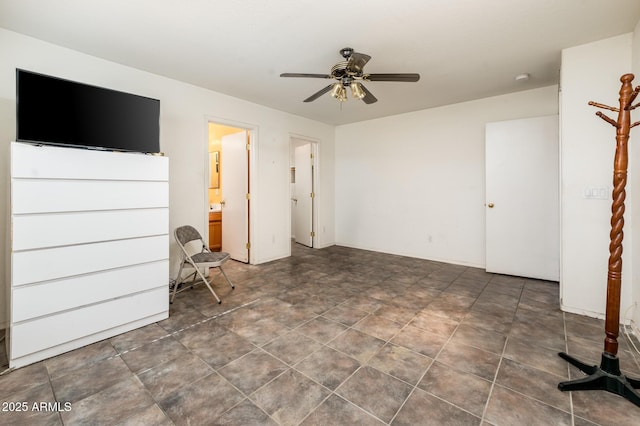 2721 N 107th Dr, Avondale, AZ 85392 - unfurnished bedroom with a ceiling fan and ensuite bath