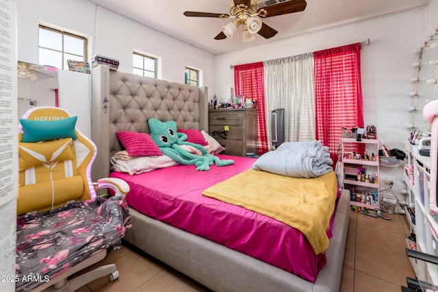 2721 N 107th Dr, Avondale, AZ 85392 - tiled bedroom featuring ceiling fan