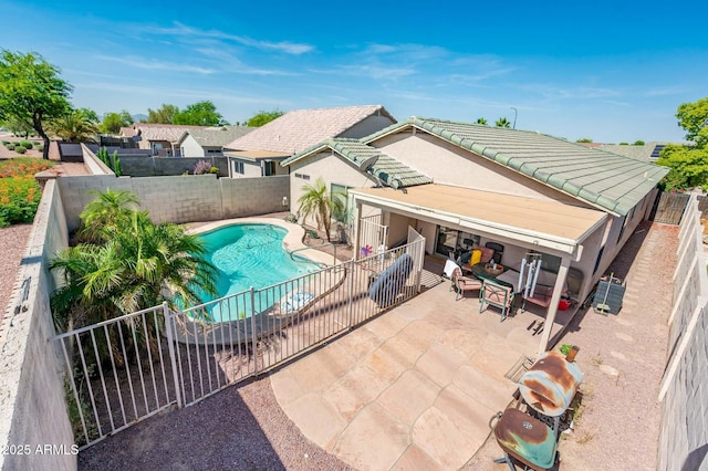 2721 N 107th Dr, Avondale, AZ 85392 - view of swimming pool with a fenced backyard and a patio area