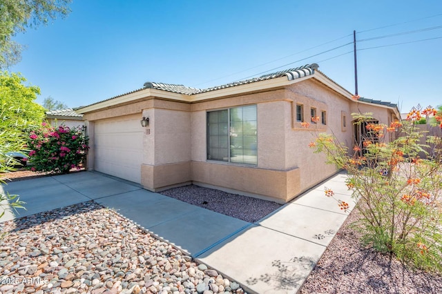 2721 N 107th Dr, Avondale, AZ 85392 - view of front of house with stucco siding and a tile roof
