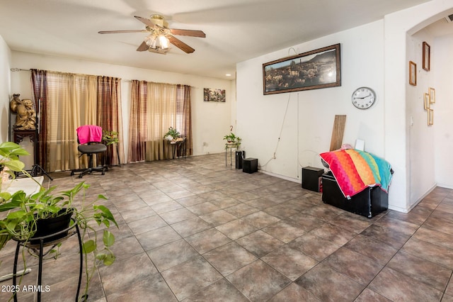 2721 N 107th Dr, Avondale, AZ 85392 - living area with a ceiling fan and arched walkways
