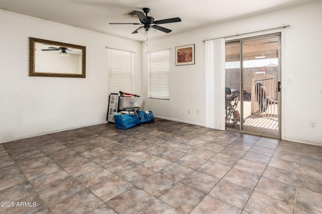 2721 N 107th Dr, Avondale, AZ 85392 - spare room with a ceiling fan and baseboards