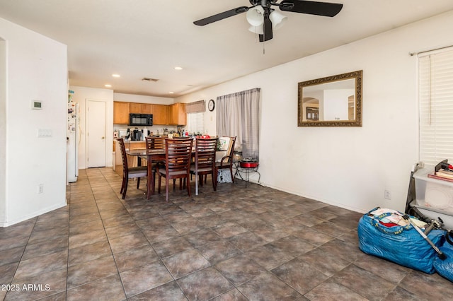 2721 N 107th Dr, Avondale, AZ 85392 - dining room with a ceiling fan and recessed lighting