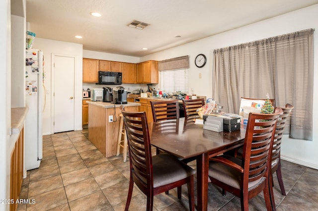 2721 N 107th Dr, Avondale, AZ 85392 - dining space featuring recessed lighting and light tile patterned floors