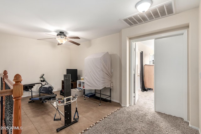 40904 N Hearst Dr, Anthem, AZ 85086 - workout room with tile patterned floors, visible vents, and ceiling fan