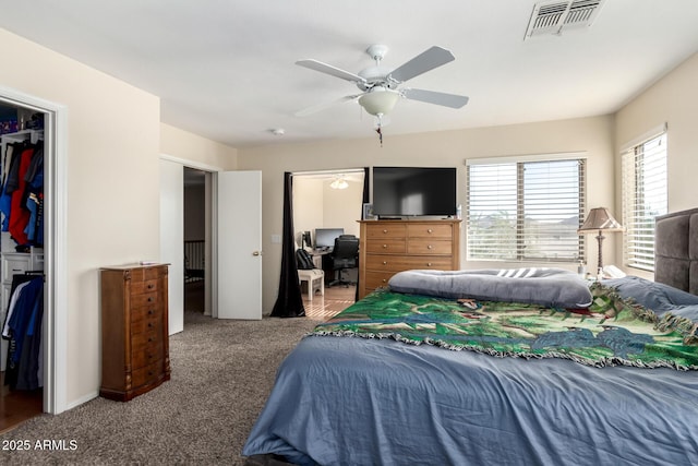 40904 N Hearst Dr, Anthem, AZ 85086 - bedroom featuring a closet, visible vents, ceiling fan, and carpet floors