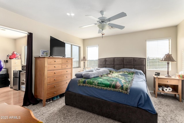 40904 N Hearst Dr, Anthem, AZ 85086 - bedroom featuring freestanding refrigerator and ceiling fan