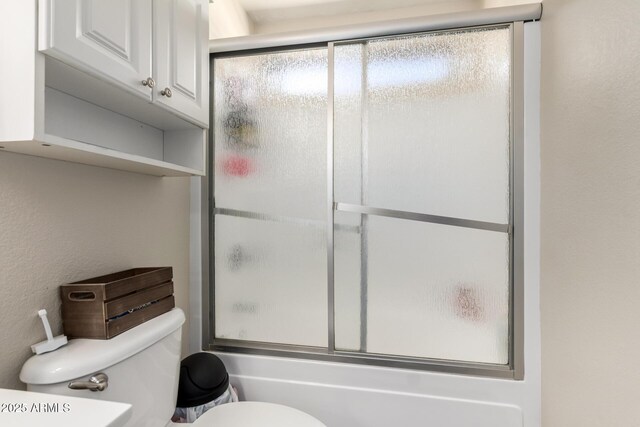 40904 N Hearst Dr, Anthem, AZ 85086 - full bathroom with toilet and shower / bath combination with glass door
