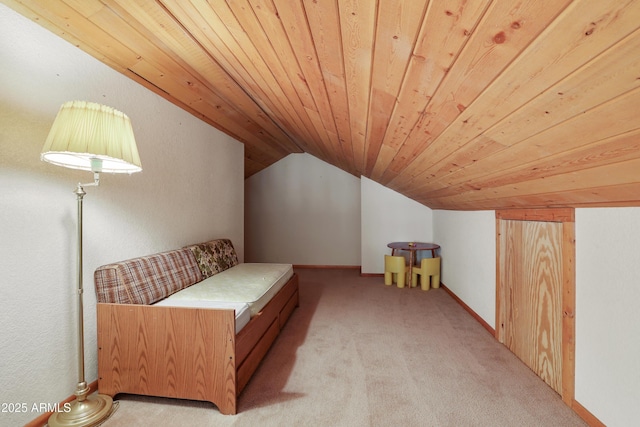 bonus room featuring lofted ceiling, wood ceiling, and light colored carpet