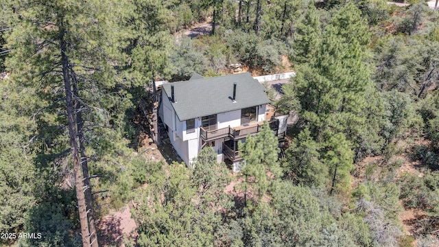 drone / aerial view with a forest view